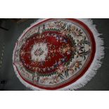 Oval washed Chinese rugs, red and cream with floral decoration 250 x 170 cm & faded gold with floral