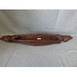 Maori type carved wood long boat