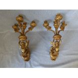 2 gilt, Regency style, wall sconces of figurehead supporting 4 branch candle holders