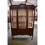 Edwardian mahogany standing display cabinet with leaded glazed central door on cabriole legs 165H