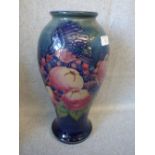 Moorcroft Pomegranate pattern vase, signed LM to the base, 32cmh
