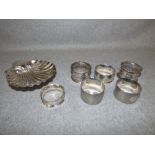 6 various hallmarked silver napkin rings & silver clam shell butter dish by 'G. M. T.' of London,