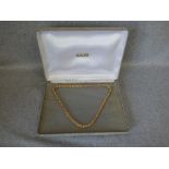 9 carat gold chain, of fancy links, 45 cm long, 24.7g gross, cased