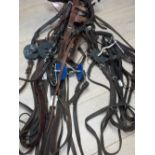 2 complete polo bridles including standing martingales, breast plates, and one other polo bridle