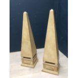 Pair of decorative cream painted obelisks