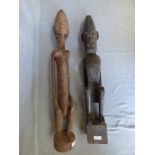 2 tribal hardwood carved figures 72H x 68H cm and Indonesian Dayak hardwood carved shield and pair