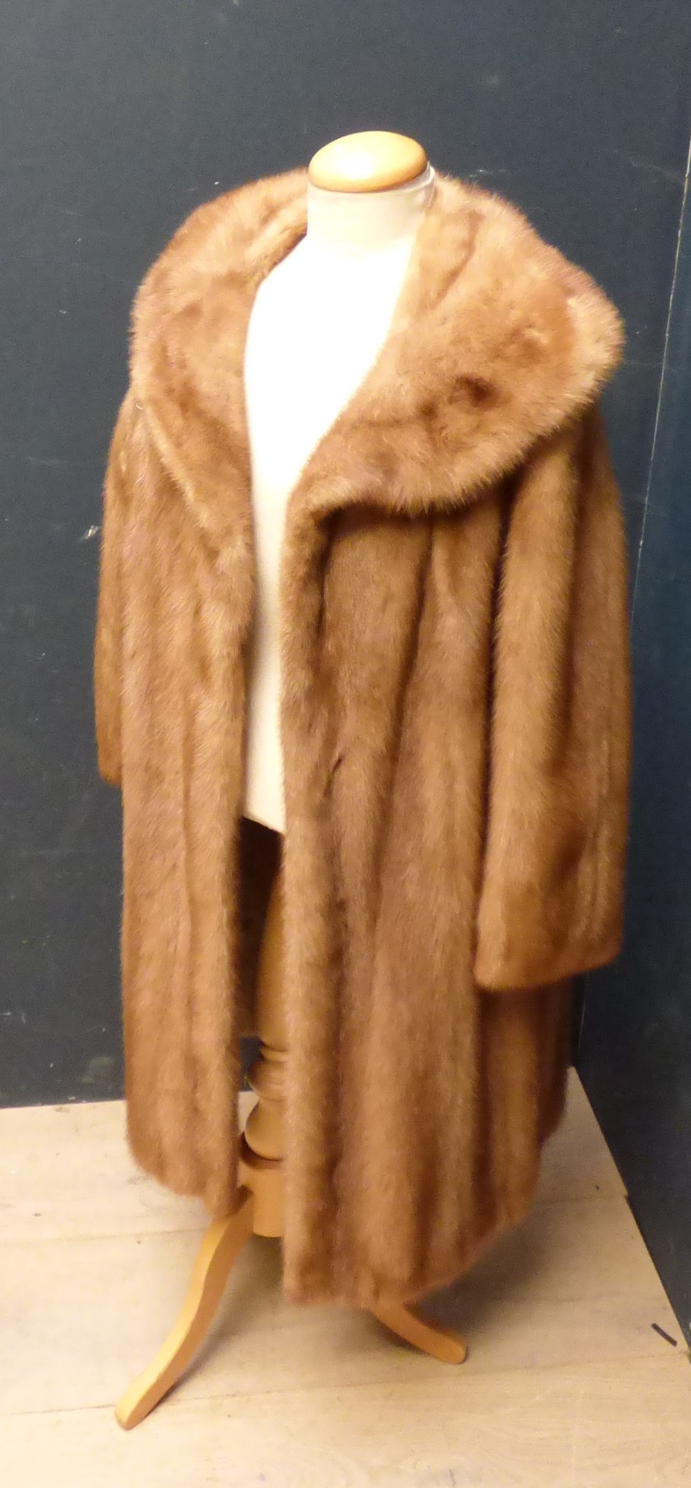 Three quarter length pale mink coat