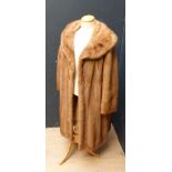Three quarter length pale mink coat