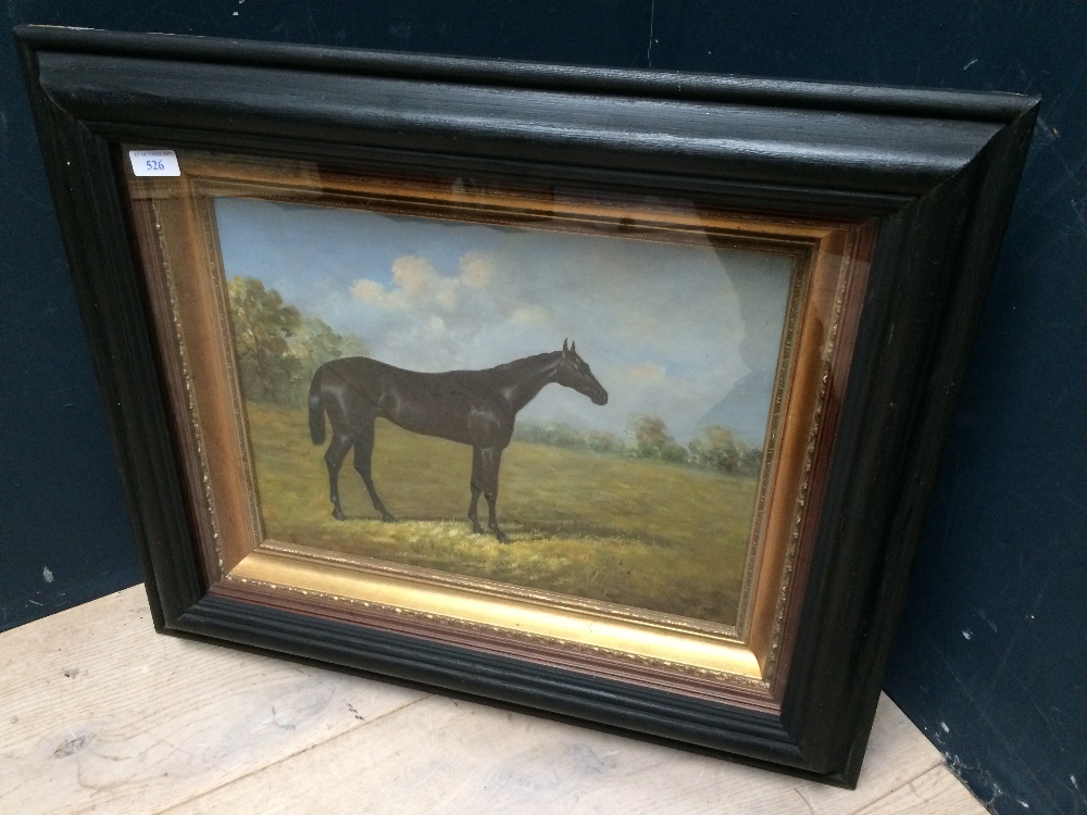 An ebonised framed equine oil painting of a 'Black Thoroughbred Horse in a Landscape', 29 x 39.5 cm