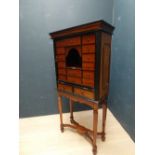 Mahogany & burr inlaid chest on a stand with 17 fitted drawers with ebony & inlaid handles, 70W x