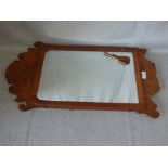 Small walnut fretwork framed mirror