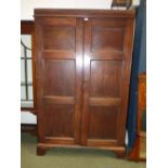 George III mahogany hanging cupboard with a pair of panelled doors on bracket feet 176H x 110W cm