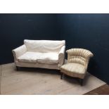 2 seater sofa with cream upholstery & mahogany legs 135L x 70H cm (1 back leg damaged) (lots 646
