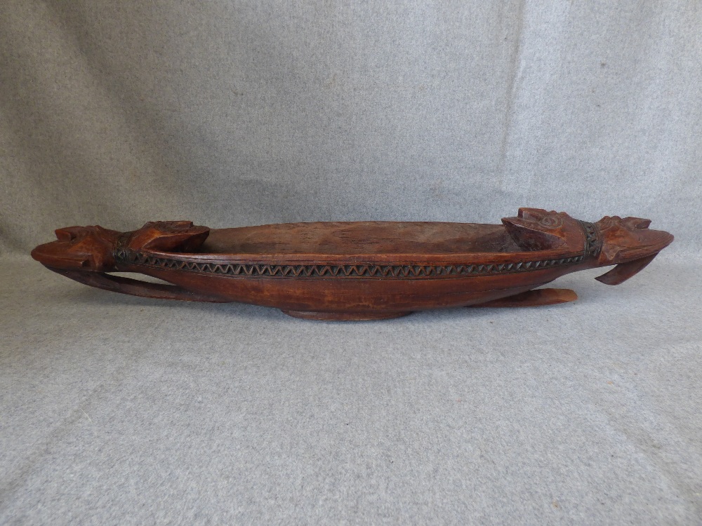 Maori type carved wood long boat