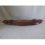 Maori type carved wood long boat