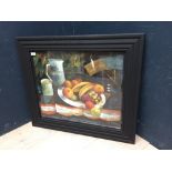 A studio framed oil painting, still life of 'Fruit and ceramic mug & jug on a table', signed, 46.5 x