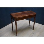 William IV inlaid mahogany fold over baize lined card table on turned top, 92L cm