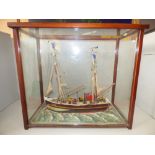 Glass cased model of a twin rigged Victorian French fishing boat, No. DI 1082 approx 47 cm
