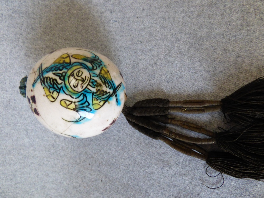 Far Eastern ceramic hanging ball with tassle
