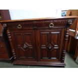 Oak sideboard with 2 single drawers over double cupboard with lion masks, made by 'Owen Scrubey of