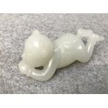 Chinese jade figure of a boy, 7cm L Please check condition before bidding