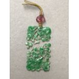 Chinese Jadeite oblong pendent (in 3 pieces) , Provenance: lots 1001-1006: items from a local