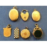 A padlock clasp, stamped '9ct'; an unmarked medal fob, a swivel seal fob and four lockets