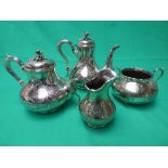 A Victorian engraved four piece tea and coffee set, comprising teapot, coffee pot, sugar basin &