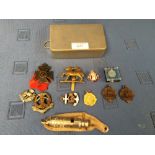 The Metropolitan patent whistle, 3 various military badges and medals & plated sandwich tin
