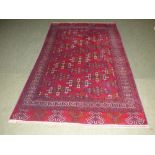 Persian oblong rug burgundy ground with all over geometric pattern and multi border 200 x 130