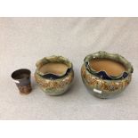 Pair of graduated size Doulton pots, 23cm & 19cm dia & an embossed copper and brass goblet