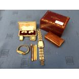 A pair of Mother of Pearl panel cufflinks, tagged '9ct', cased; an unusual paste set dress clip