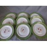 Set of 9 Continental gilt rim dinner plates with floral decoration