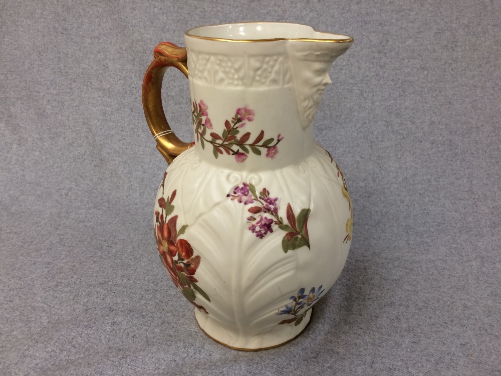 Royal Worcester cabbage leaf jug with mask spout & painted flowers