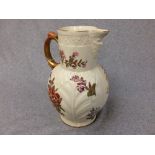 Royal Worcester cabbage leaf jug with mask spout & painted flowers