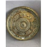 Indian brass charger with embossed decoration of fish & dragons 56 cm dia.