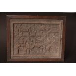Chinese tea brick decorated with figural scenes, framed, 25 x 20cm. Provenance: From the