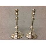 Pair of hallmarked silver circular candlesticks, London 1962, 26cm H