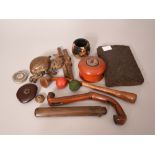 A collection of assorted Oriental objects to include wood pipe, lacquer box, tea brick and etc.
