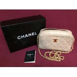 Ladies Chanel quilted cream leather handbag and chain strap, with original box & card, No. 3838692