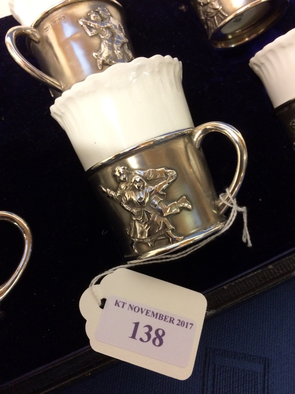 Cased set of Doulton coffee cans & saucers, for 6, in hallmarked silver holders, embossed with - Image 2 of 2