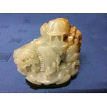 Chinese jade carving of mountainous landscape with figures on a stand, 9cm H Please check