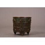 C17th Chinese bronze cylindrical censer, cast with a central band of six characters above a band