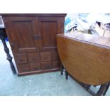 Indian style teak T.V. cabinet with 8 single drawers & oak gate leg table