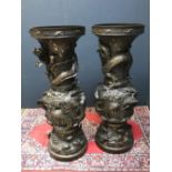 Pair of large 3 piece Chinese bronze urns, extravagantly decorated with raised mythical beasts,