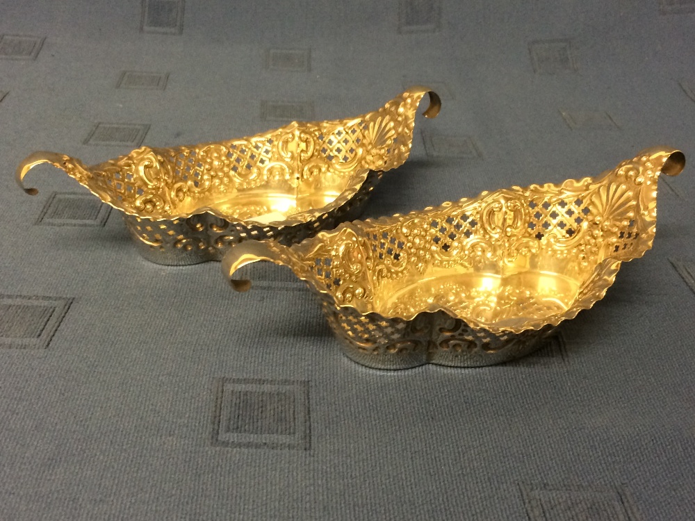 Pair of hallmarked silver boat shaped open work bon bon dishes, London 1897