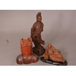 Chinese hardwood carved figure of Guanyin, 28cm high; together with a hardwood carved figure of a