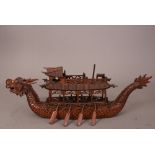 C19th/20th Chinese hardwood carved model of a dragon boat, 53cm long. Please check condition