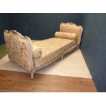 A French painted and parcel giltwood framed day bed