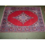 Persian red ground rug central loztenges with wide border, stylized and geometrics pattern 180 x